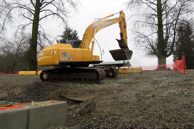 Construction of Derby Reach wheel chair access fishing ramp in Langley BC. Photo by Roger Bean.